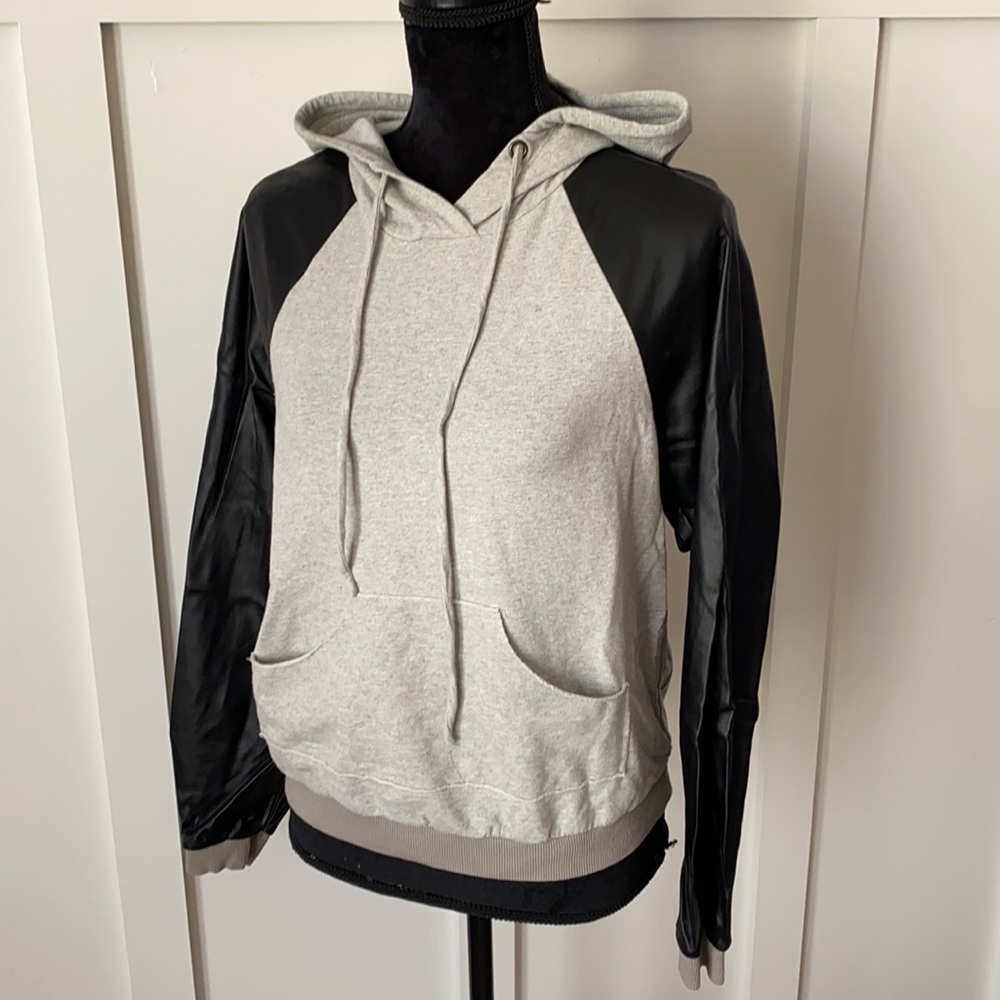Boutique hoodie with faux leather sleeves